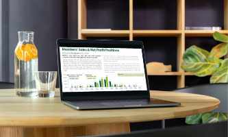 Laptop showing sales figures