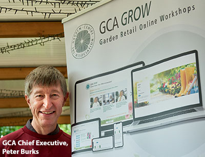 GCA Chief Executive, Peter Burks - with the GCA GROW banner for the Garden Retail Online Workshops for the new Mental Health and Wellbeing course